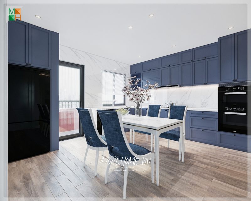 Bàn ăn được làm từ gỗ tự nhiên sơn trắng, bọc bởi nỉ nhung màu xanh sang trọng.