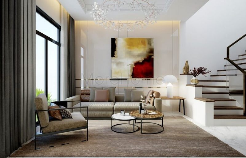 Mẫu sofa phòng khách hiện đại bọc bằng vải được sử dụng trong thiết kế nội thất của nhà phố Lake View ở Hồ Chí Minh.